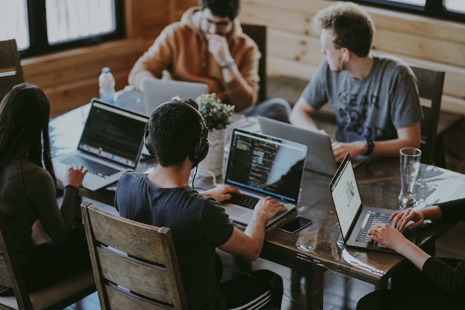 Team collaborating on workflow automation solutions at a modern workspace